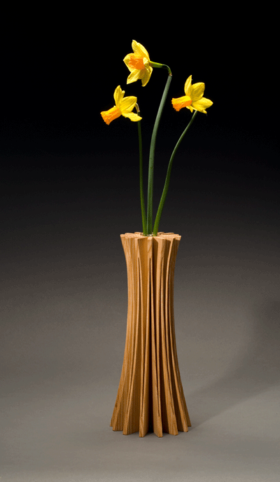 Modern ash wood vase made from one piece of wood
