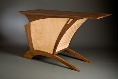 custom living room entertainment center made from walnut and maple wood