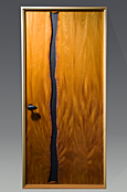 Slate and Mahogany door hand carved and finished by furnituremaker Seth Rolland