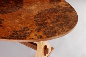 Oval expanding dining table top in walnut burl by Seth Rolland custom furniture design