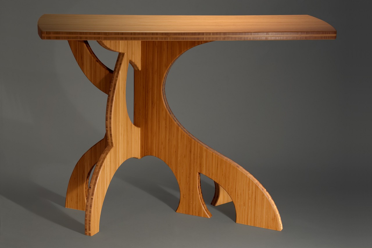 curved bamboo hall table with sculptural, organic legs by Seth Rolland custom furniture design