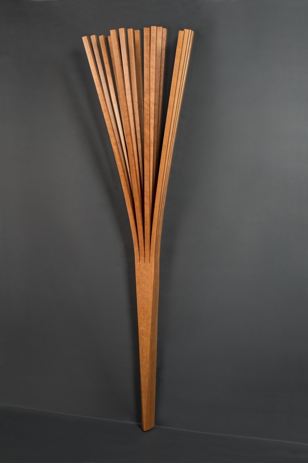 Branch coat rack is a wall mounted hall tree made from solid wood steam bent by Seth Rolland custom furniture