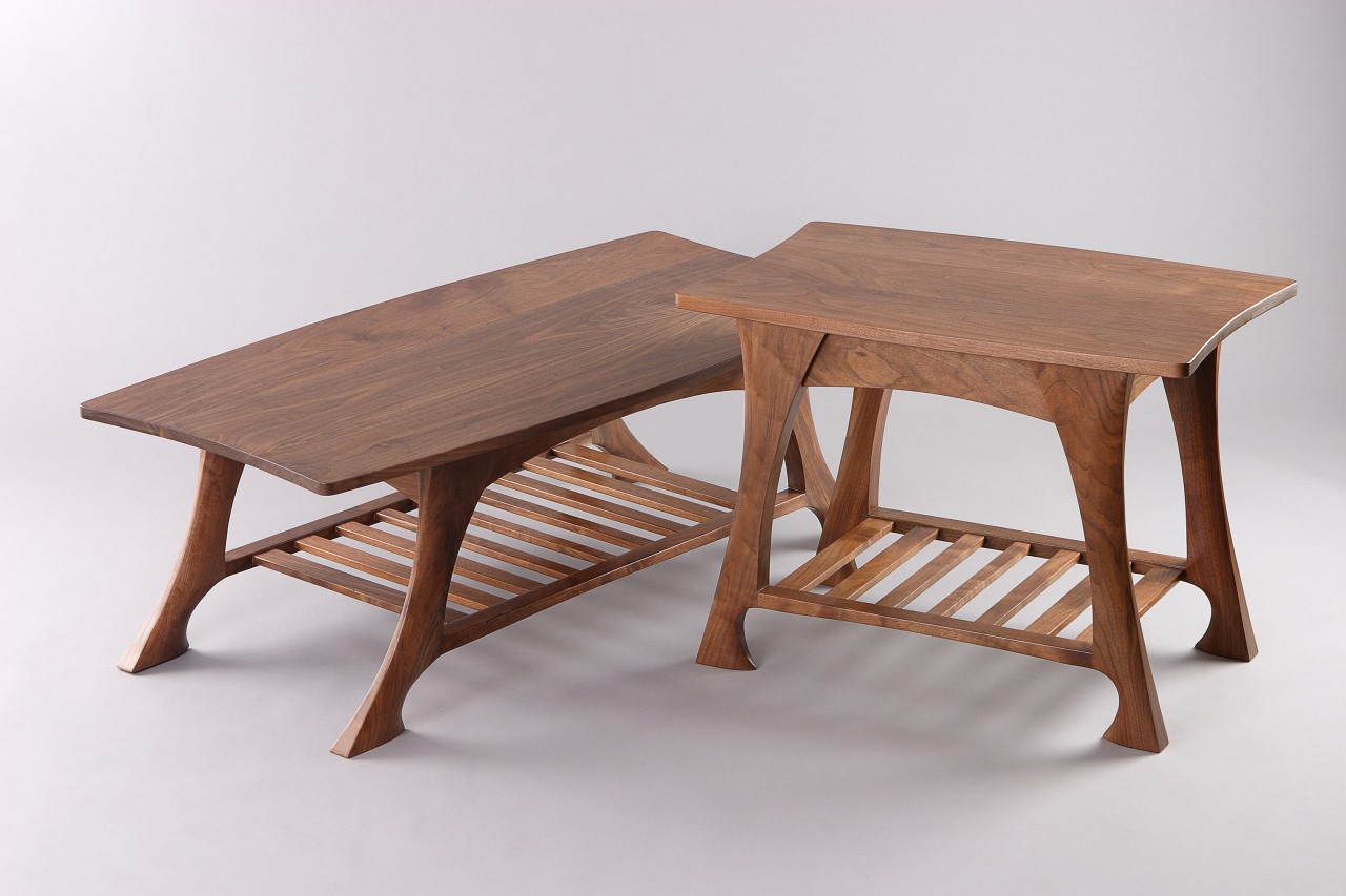 End table, coffee table and side table with shelves in hand carved walnut by Seth Rolland custom furniture design
