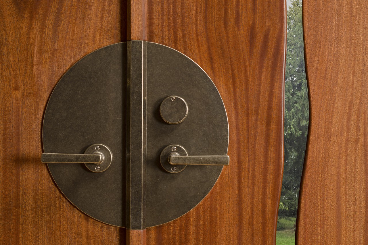 Lock and handle detail for Cascade double door by Seth Rolland custom furniture design