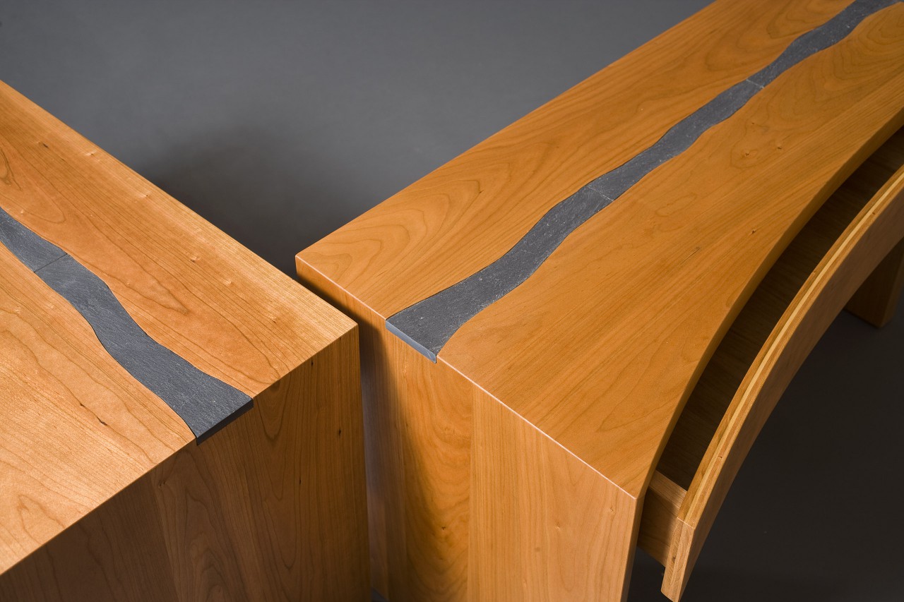 Detail of wood and slate nightstands with drawers custom made by Seth Rolland woodworks