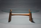 Clearwater coffee table with oval glass and solid coopered walnut wood by Seth Rolland custom furniture design