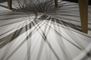 Corona dining table shadows at Bellevue arts museum show by Seth Rolland custom furniture design