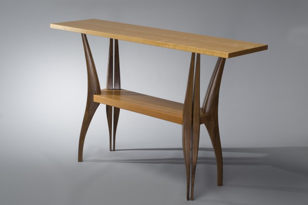 Modern, sculptural solid wood hall table made from walnut and cherry wood by Seth Rolland Custom Furniture LLC