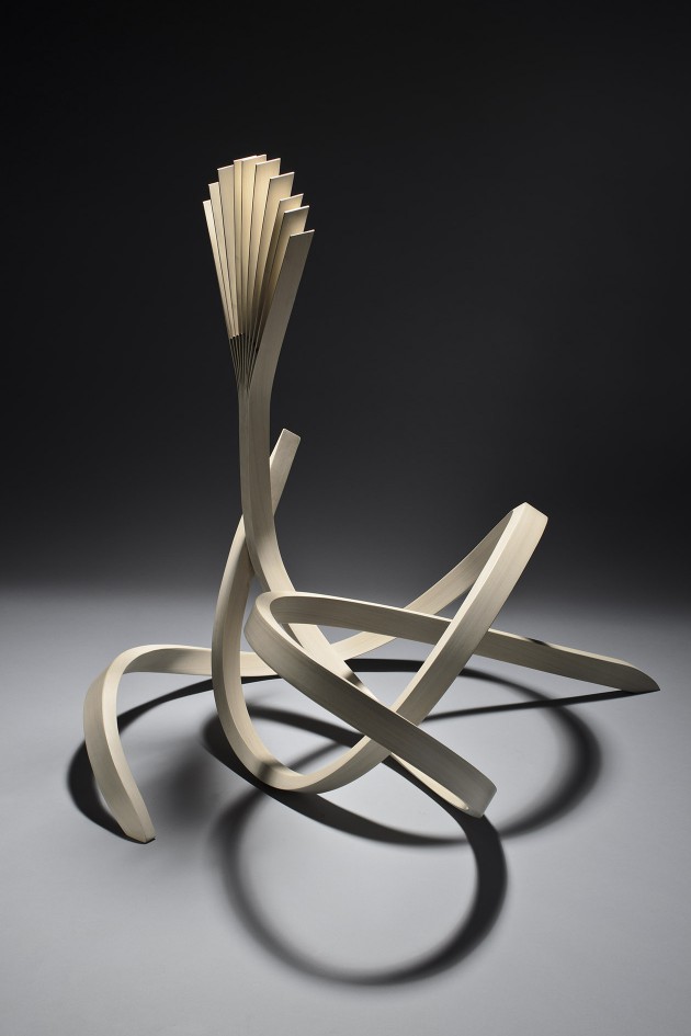 Helios wood sculpture by Seth Rolland