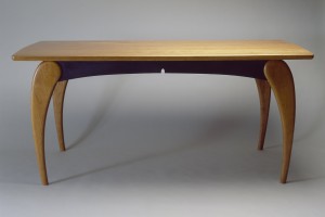 Rectangular wood dining table in cherry with curved legs custom made by Seth Rolland furniture design