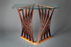 Architectural wood Parabola hall entry table console with glass top by furniture maker Seth Rolland