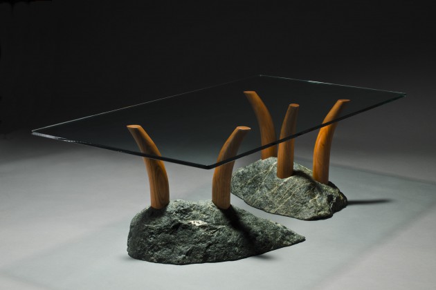 Stone and cherry wood coffee table with glass top by Seth Rolland custom furniture design