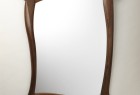 Walnut wall mirror with carved sculptural frame by Seth Rolland custom furniture design