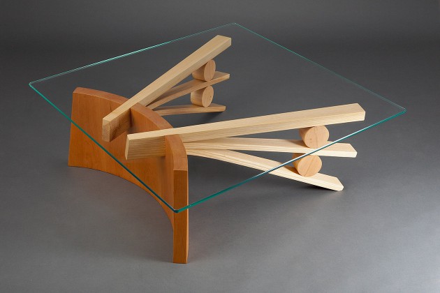 Square glass top coffee table with curved wood base made from coopered cherry and bent ash wood by Seth Rolland Custom Furniture design