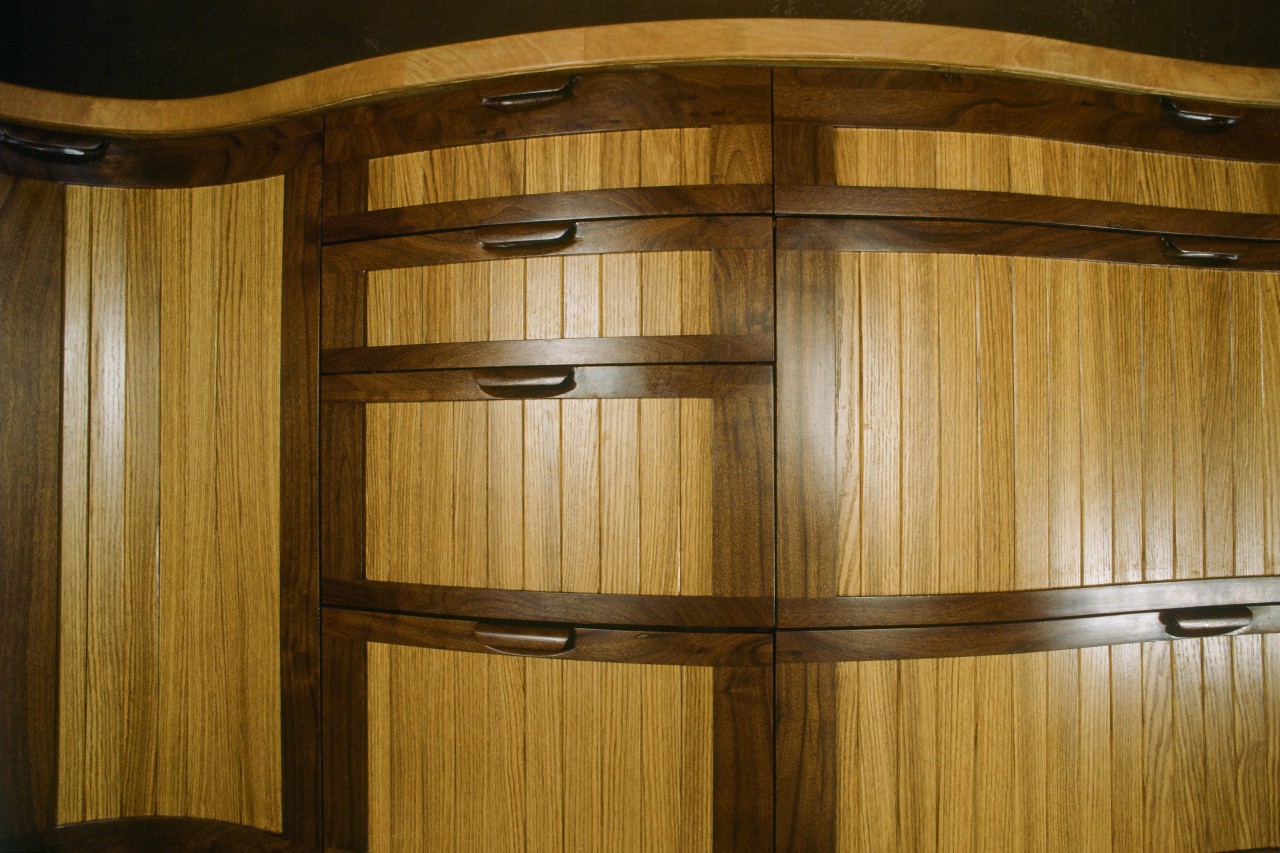 Curved walnut and oak cabinets by Seth Rolland custom furniture design