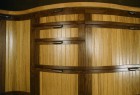 Curved walnut and oak cabinets by Seth Rolland custom furniture design