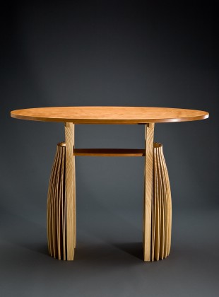 Expanded wood entry hall table console from ash and cherry with elliptical top by Seth Rolland custom furniture design