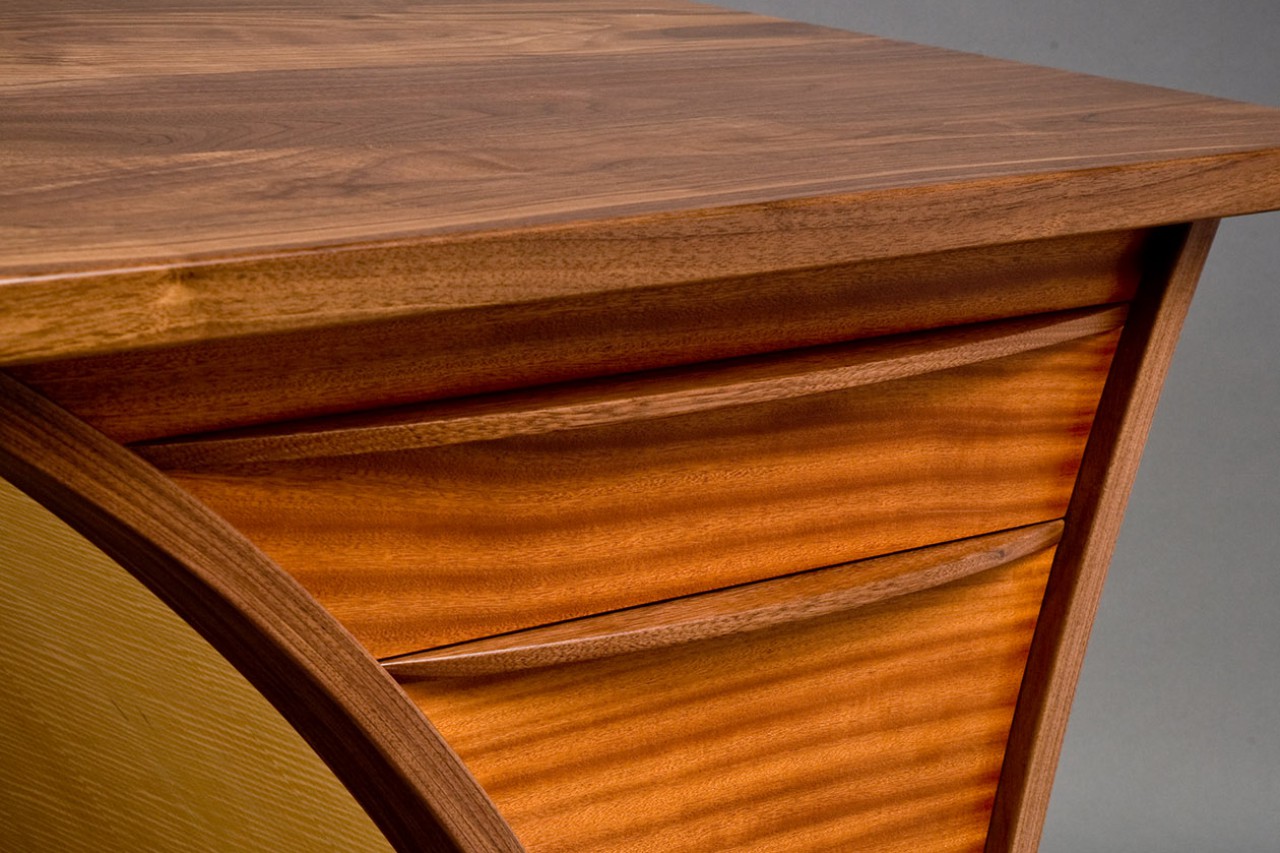 Detail of walnut, sapele and maple desk by Seth Rolland custom furniture design