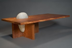 handmade custom cantilevered Eddy coffee table with carved mahogany and granite hand crafted by Seth Rolland furniture