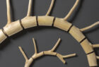 detail of cedar wall sculpture by Seth Rolland